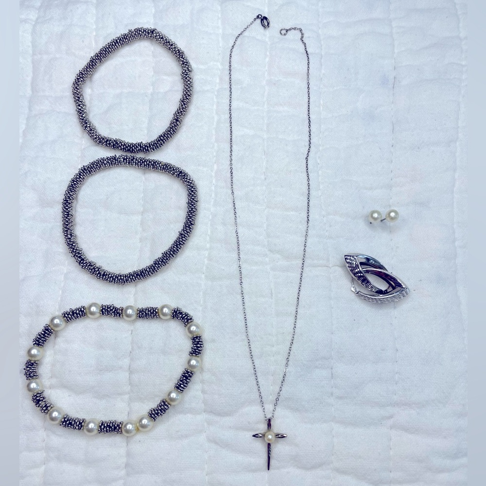 1 Silver Cross Necklace w/Pearl, 3 Silver Bracelets, 2 sets of Earrings. Vintage